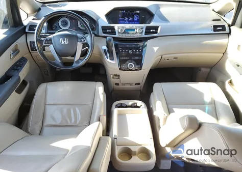 2012 Honda Odyssey Exl z USA, uszkodzony, nr VIN 5FNRL5H65CB030198